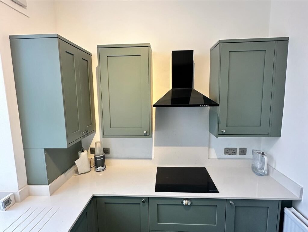 A close-up of seamless Quartz worktops in a custom kitchen installation by ProCut Carpentry in Peacehaven.