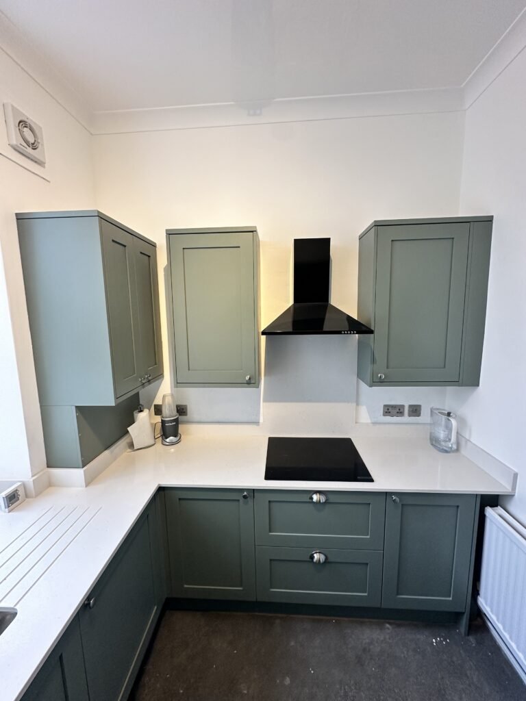 A functional kitchen with optimal storage and workspaces, installed by ProCut Carpentry in a Peacehaven home.