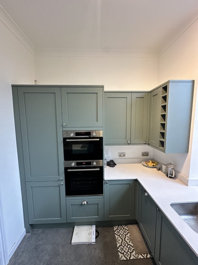 A beautifully installed modern kitchen with Quartz worktops, crafted by ProCut Carpentry in Peacehaven.