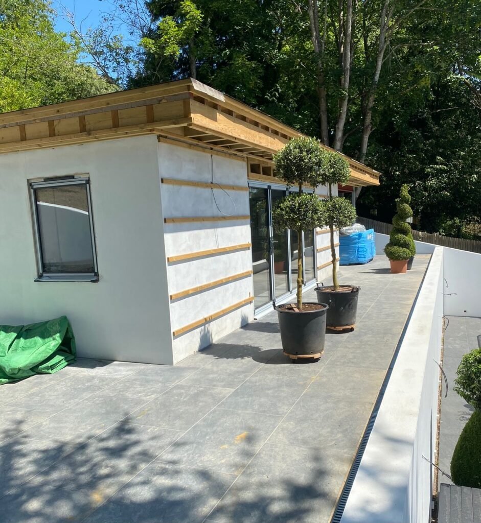 Skilled installation of cladding on a summer house, reflecting Procut Carpentry’s craftsmanship in Brighton.