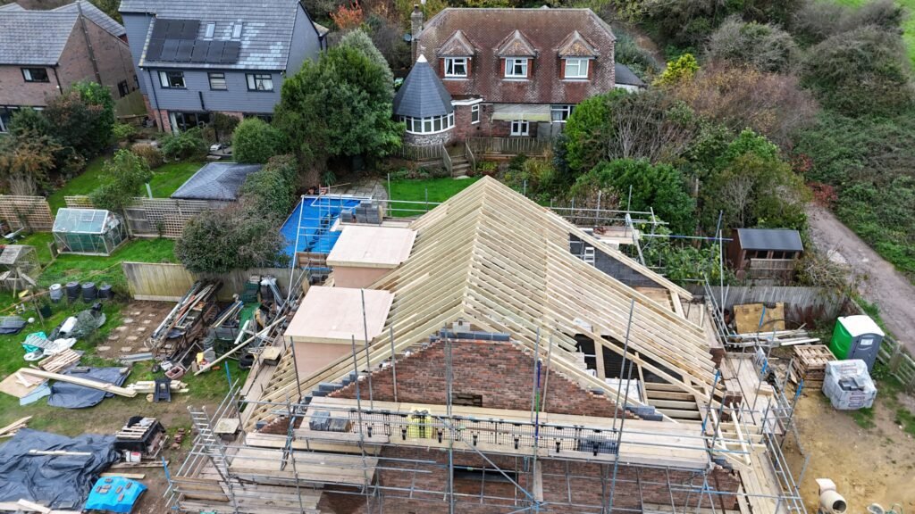 View from above of custom roof structure with dormers on Peacehaven project