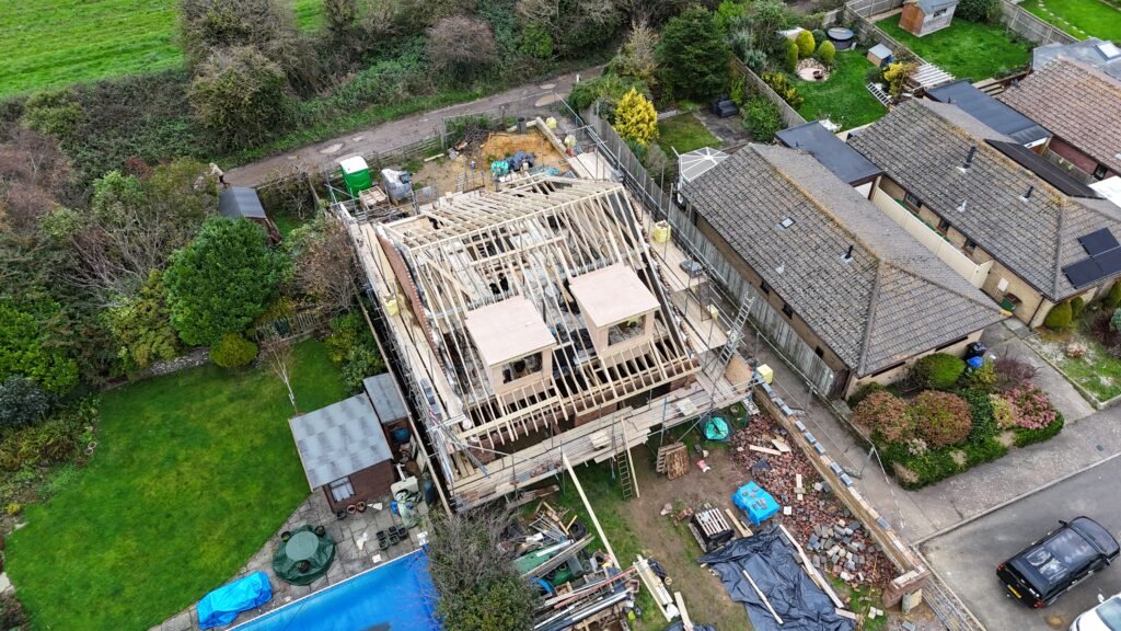Aerial perspective of Procut Carpentry’s hand-cut roof and dormers on Peacehaven new build