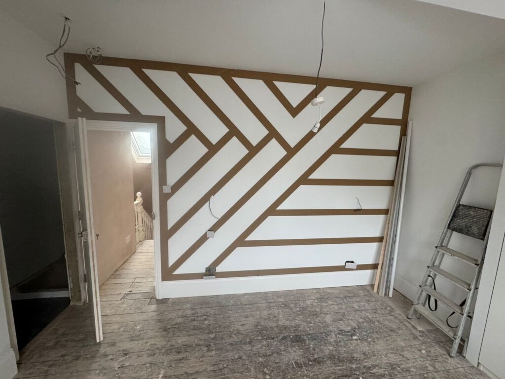 Tailored wall panelling designs for eight HMO bedrooms in Hove by Procut Carpentry.