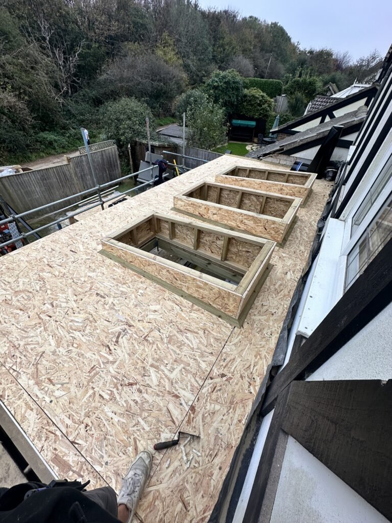 Flat roof extension with skylights in Peacehaven, expertly crafted by ProCut Carpentry.