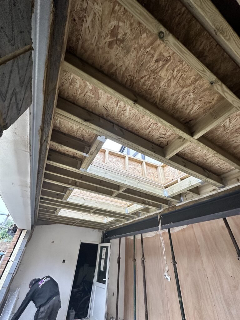 "Skylights integrated into a flat roof to enhance natural light in Peacehaven by Procut Carpentry.