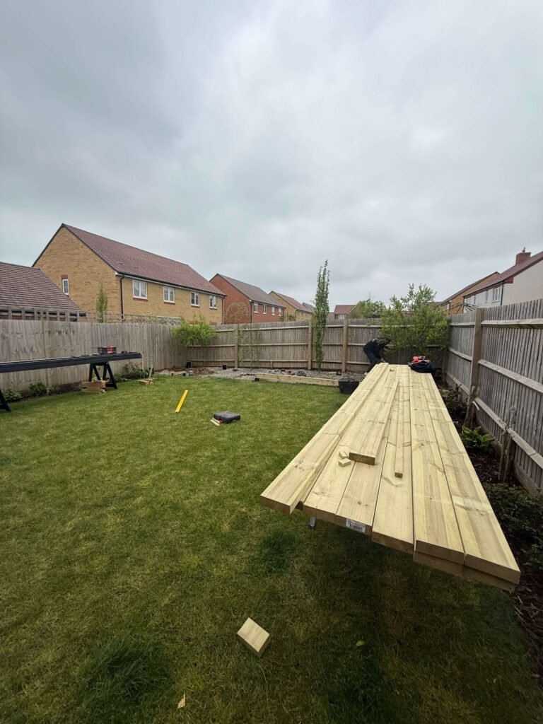 Environmentally friendly composite decking installed in Lancing backyard.
