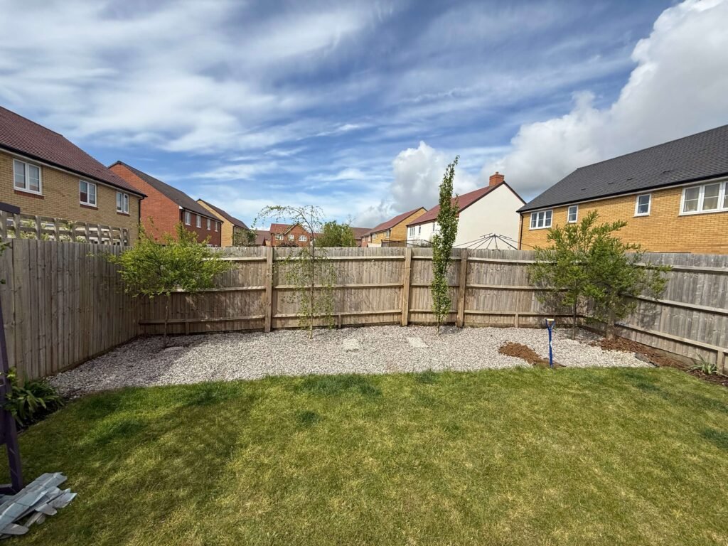 Custom-fitted composite decking tailored to unique garden layout in Lancing.