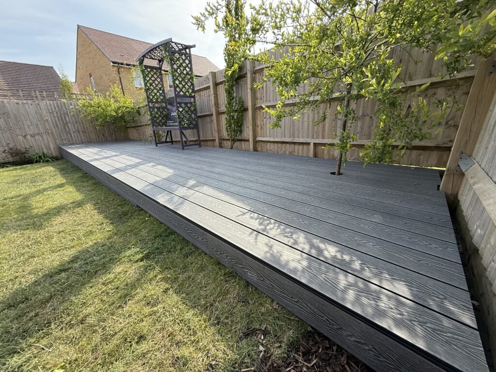 Enhanced outdoor living space in Lancing featuring composite decking installation.