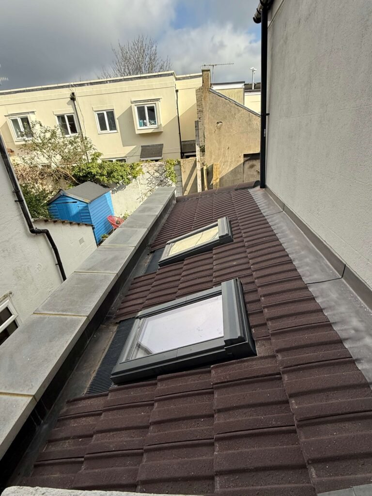 Seamlessly aligned timber cladding boards by Procut Carpentry in Hove renovation.